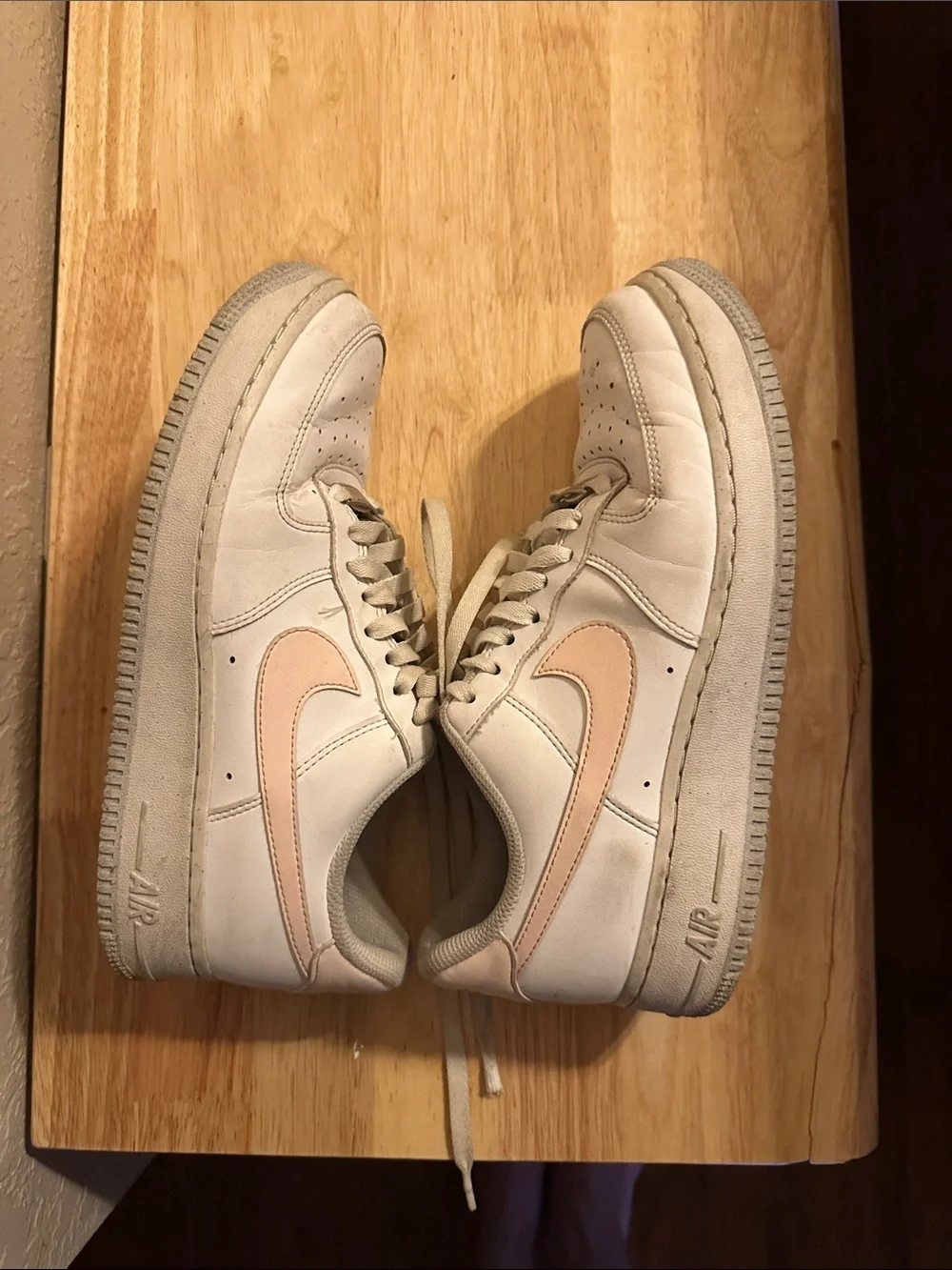 Nike White Low-Top Sneakers with Light Pink Swoosh